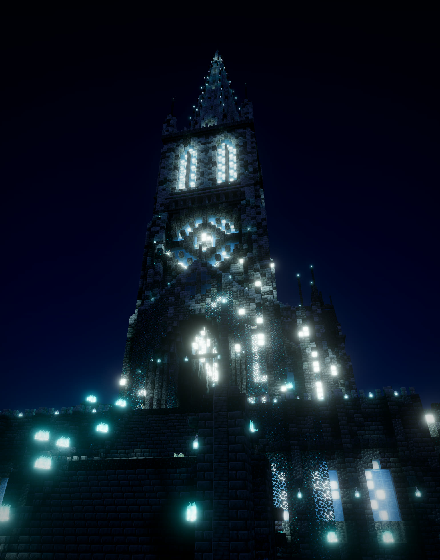 Night shader render of a towering gothic cathedral whose rose window, belfry and spire glow cold cyan, built with Moxel Worlds